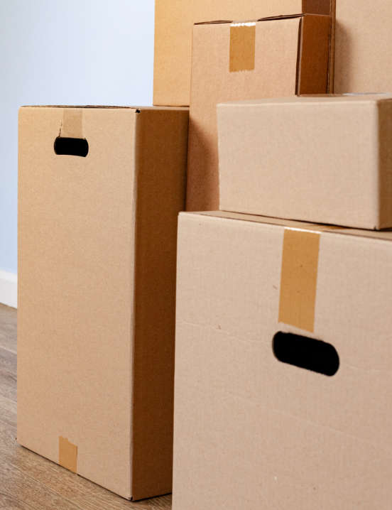 Cardboard boxes sitting in living space
