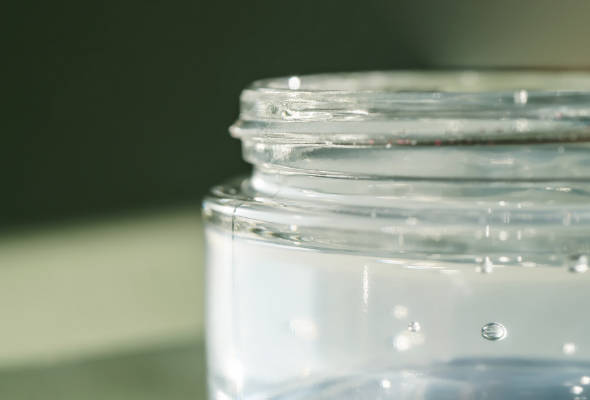 Jar showcasing EcoSynthetix product